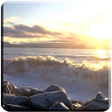 プログラムのアイコン：Waves on Rocks Video Wall…